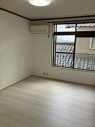 シティハイムオシダ 201 2階2DKの寝室