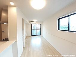 リバーサイド北園 101 1階1LDKのリビング/ダイニング