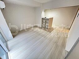 アヴァンス西亀有 3階1LDKのリビング/ダイニング