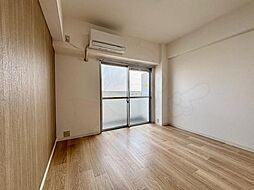 サンプラザ総持寺 6階1Kのリビング/ダイニング