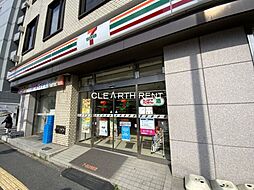 【コンビニエンスストア】セブンイレブン 足立中居郵便局前店まで221ｍ