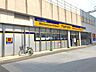 周辺：薬マツモトキヨシ えきマチ1丁目千早駅店（585m）
