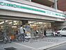 周辺：LAWSON STORE100　京都外大前店まで650メートル