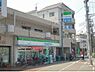 周辺：ファミリーマート　紫明通店まで260メートル