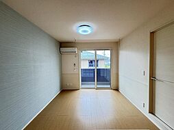 オリンピアパーク 203 2階1LDKのリビング/ダイニング