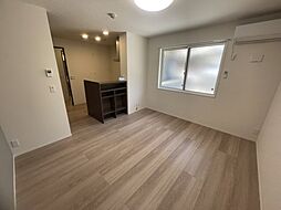 バレンティア 105 1階1LDKのリビング/ダイニング