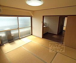 京都市営烏丸線 北大路駅 徒歩29分の賃貸マンション 4階2DKのリビング/ダイニング