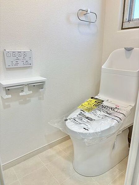 毎日使うトイレは落ち着きと清潔感のあるデザイン