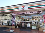 コンビニ「セブンイレブンまで210m」