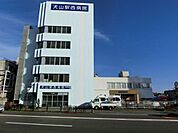 病院「犬山駅西病院まで861m」