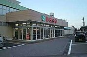 スーパー「トミダヤ垂井店まで930m」