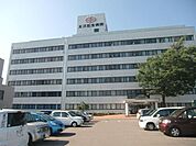 病院「木沢記念病院まで870m」