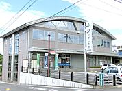 銀行「JAひがしみの本店まで1084m」