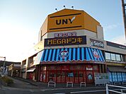 スーパー「MEGAドン・キホーテUNY恵那店まで2634m」