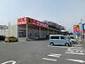 周辺：ドラッグストア 「サンドラック（薬局・日用品）まで1200m」