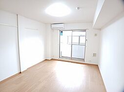 アルカンシェル 1階ワンルームのリビング/ダイニング