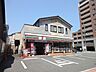 周辺：セブンイレブン 京都西大路松原店（254m）