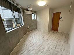 シアターハウス三園 1階1Kのリビング/ダイニング