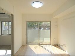 KCCフラット西京極 106 1階1LDKのリビング/ダイニング