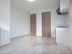 エムコート衣笠 102 1階ワンルームのリビング/ダイニング