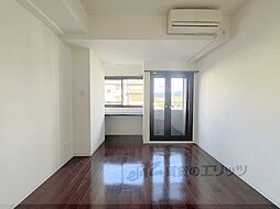 グランスイート鴨川 405 4階ワンルームのリビング/ダイニング