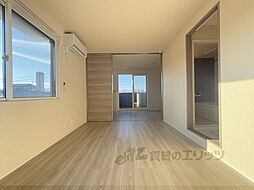 ｖｏｇｕｅ京都桂 203 1階1LDKのリビング/ダイニング