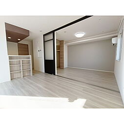 トリシア東口 1階1LDKのリビング/ダイニング