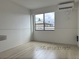 ウィズ・テール南彦根1号館 202 2階1LDKのリビング/ダイニング