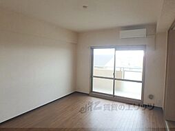 近鉄京都線 伊勢田駅 徒歩3分の賃貸マンション 1階3LDKのリビング/ダイニング