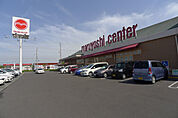 マルヨシセンター松縄店(スーパー)まで460m