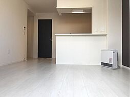 コスモ ガーデン 1階1LDKのリビング/ダイニング