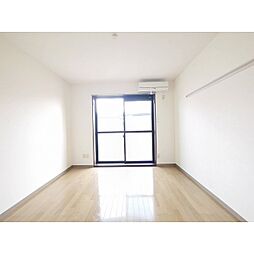 トップアスリートIII 201 2階1Kのリビング/ダイニング