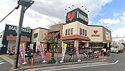 スーパーマルヤス登美の里店 305m