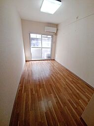 京王動物園線 多摩動物公園駅 徒歩5分の賃貸マンション 1階1Kのリビング/ダイニング