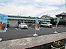 周辺：ファミリーマート 西伊興四丁目店（182m）