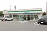周辺：ファミリーマート港春田野店 152m