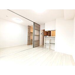 アイオーラT.S II 1階1LDKのリビング/ダイニング