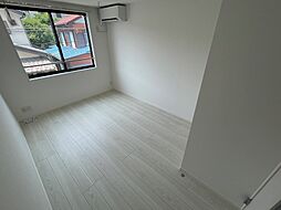 丘の上のフルール 202 2階1Kのリビング/ダイニング