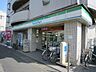 周辺：ファミリーマート京王稲田堤駅前店 159m