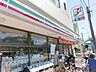 周辺：セブンイレブン川崎堰店 690m