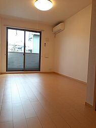 セレノカーサIII 1階1SKのリビング/ダイニング