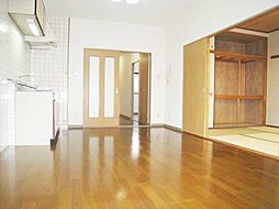 ファミリーコーポ明神 102 1階2LDKのリビング/ダイニング