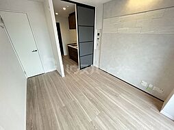 カッサーロ　II 1階1Kのリビング/ダイニング