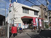郵便局「守口八雲西郵便局まで502m」
