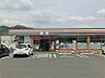 周辺：セブンイレブン 斑鳩町龍田店（691m）