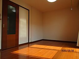 ラフィネ倉澤A棟 2階1LDKのリビング/ダイニング