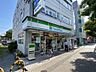 周辺：ファミリーマート 枚方岡東町店（310m）