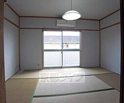 近鉄京都線 富野荘駅 徒歩4分の賃貸マンション 1階2DKのリビング/ダイニング