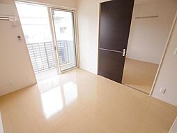 メゾーネ三郷中央 1階1LDKのリビング/ダイニング