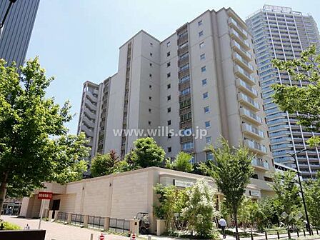 ユニエス南千里丘の外観(北西側から)最上階13階部分、南東向き住戸につき採光、通風良好!室内は引き戸を多く採用!収納力豊富なお住まい!